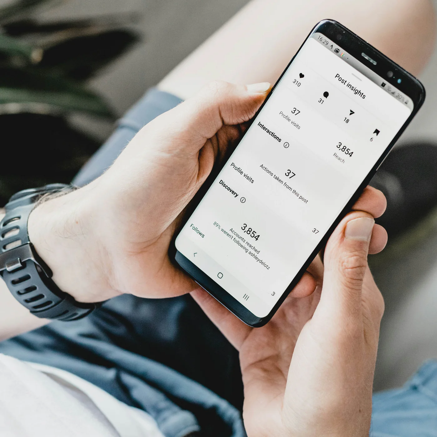 hands holding mobile